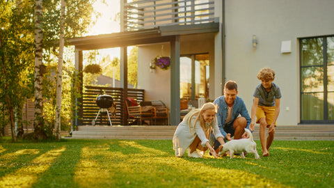 Happy family with happy dog