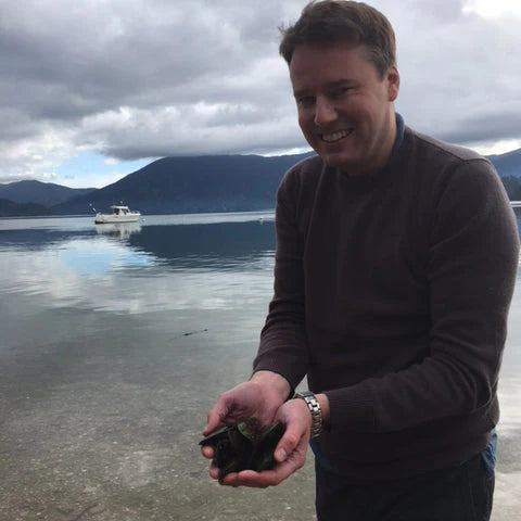 John Howie collecting green lipped mussels